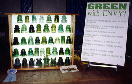 green insulators of different shapes and sizes